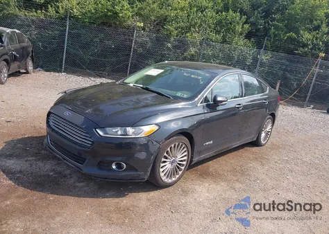 2014 Ford Fusion Hybrid Titanium from USA, damaged, VIN 3FA6P0RUXER191158